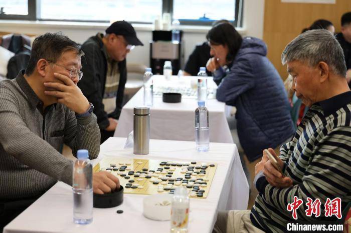 竞技交流与行业联谊并行 体育新闻界棋牌联谊赛在京举行